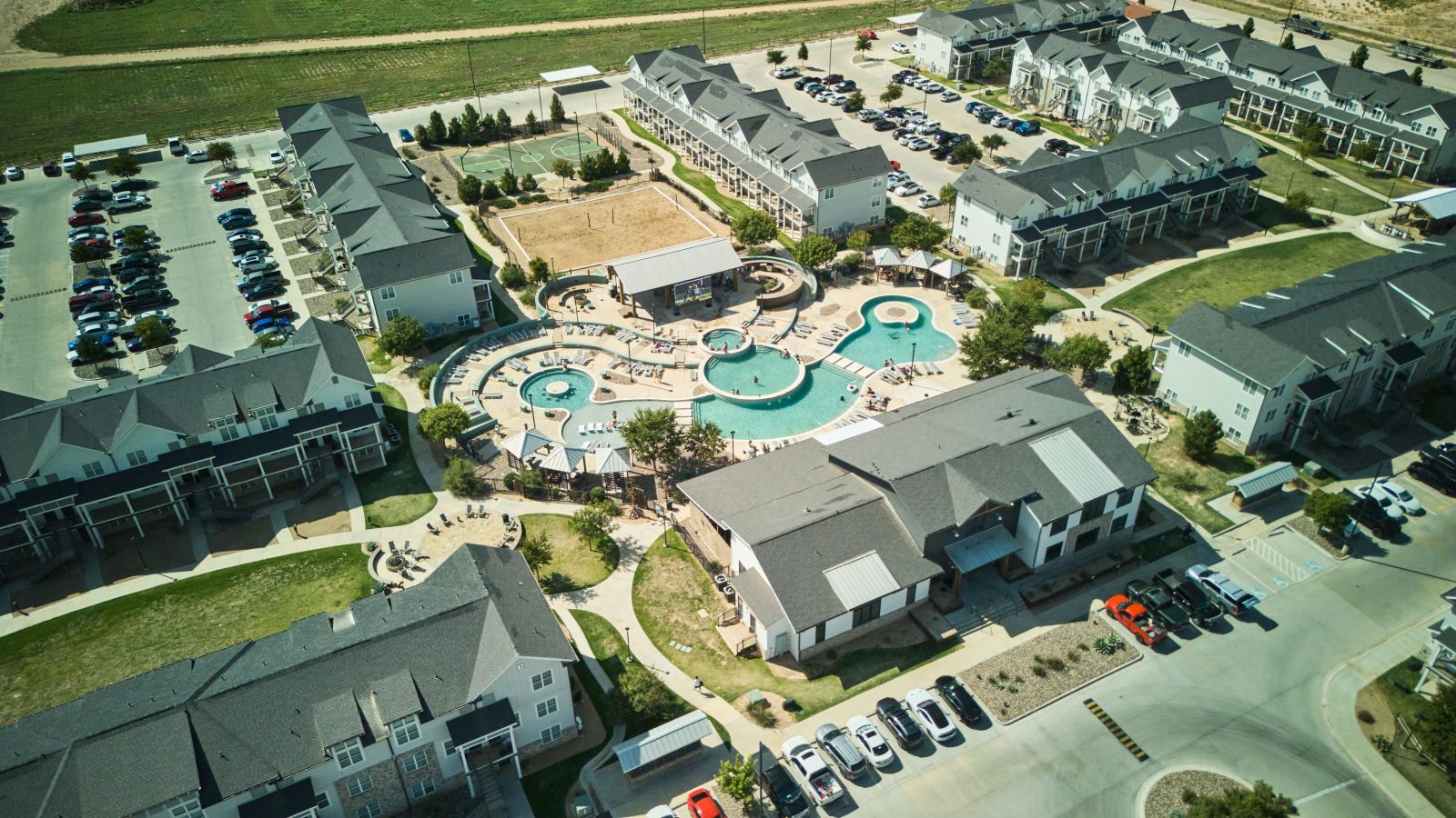 Overhead view of apartment complex and pool